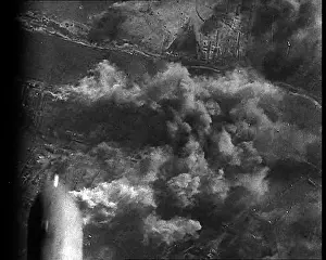 Dropping: Bombs Dropping From the Open Bomb Bay Of An