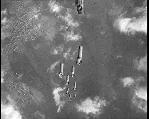 Dropping: Bombs Dropping From the Open Bomb Bay Of An