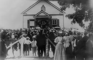 Booker: Booker T. Washington addressing crowd from ?