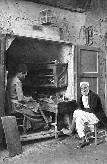 Cobbler: Bootmaker at work, Jaffa, Western Israel