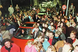 Reunions: Border crossing in Berlin (InvalidenstraYe) after openin