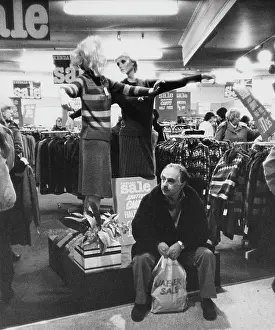 Bored: Bored-looking man at the sales