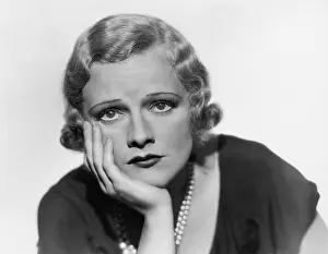 Hopelessness: Bored woman with hand on chin