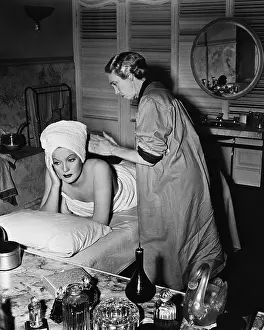 Therapist: Bored young woman getting massage
