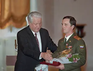 Congratulates: Boris Yeltsin at state awarding, 1996