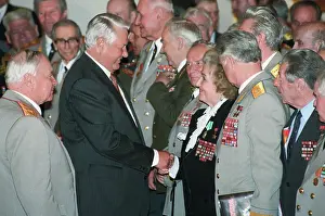 Greets: Boris Yeltsin and war veterans, 1995