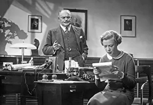 Typewriter: Boss and secretary in the office, 1932