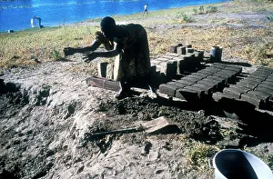 Brickmaking: Botswana, Okavango Delta, 1990s : Making bricks. Photo: