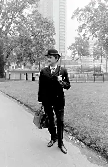 Hatted: Bowler-hatted City gent in a park
