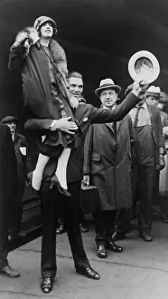 Heavyweights: Boxer Jack Dempsey in Chicago, hoisting his bride