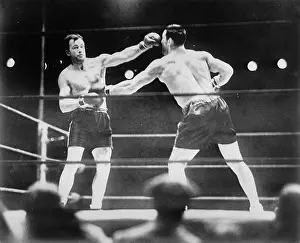 22th: The boxer Jack Sharkey (left) and