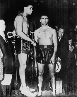 22th: The two boxer Joe Louis (left) and