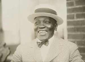 Heavyweights: Boxer John Johnson, smiling broadly, in a