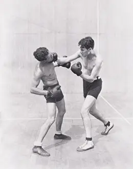 Adversity: Boxer throwing a right hook