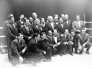 Ties: Former boxing champions in a boxing ring