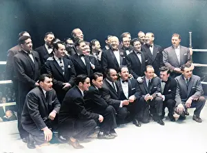 Ties: Former boxing champions in a boxing ring