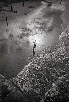 Doing: Boy on beach