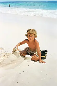 Sandcastles: boy - beach - sandcastles - Bermuda