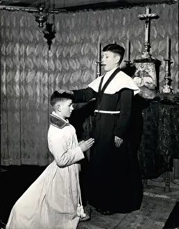 Origins: Boy bishop and his chaplain, Addlestone, Surrey