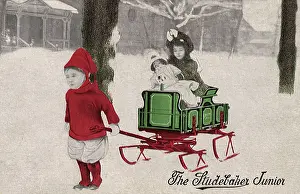Yule: Boy carrying Girl on Sled