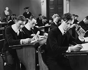 Examinations: Boy cheating in test in school exam