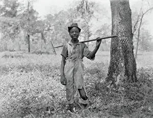 Ripped: Boy - child - rake - laborer