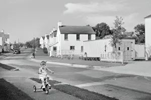 Greenbelt: Boy - child - tricycle - community