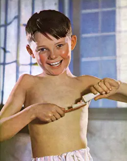Squeezing: A boy cleaning his teeth