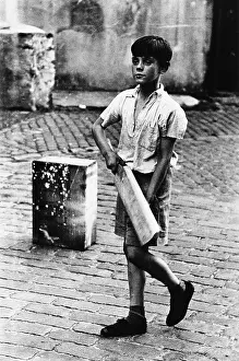 Upturned: Boy with cricket bat, Addison Place
