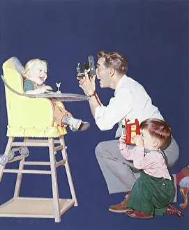 Highchair: Boy and Dad Snap Photos