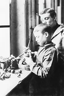 Preparatory: Boy doing preparatory work in a diamond cutting shop, 1904