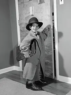 Dress Up: Boy dressed in father's clothes holding attache