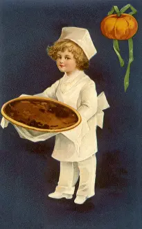 Chefs: Boy dressed like a Chef serves a Pie