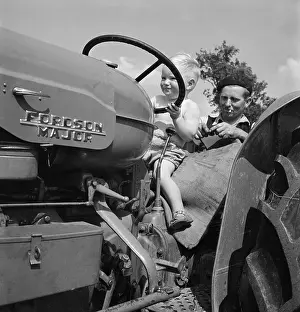 Underage: Boy Driving Tractor