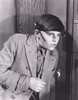 Pencils: Boy eavesdropping at door