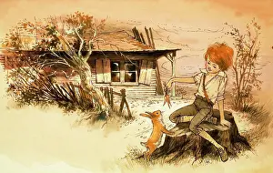 Redhead: Boy feeding carrots to a rabbit