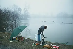 Besley: Boy fishing on a misty day