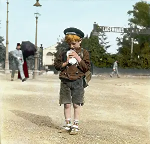 Fondling: Boy fondling a pigeon