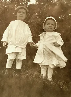 Infants: Boy and girl holding hands