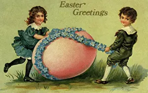 Santas: Boy and Girl with Large Easter Egg