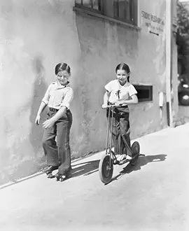 Workout: Boy and girl playing on a scooter and the other