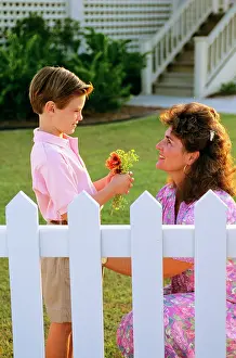 Laf002: Boy Giving Flowers to his Mother