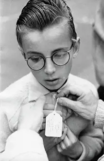 Itinerary: Boy being got ready for evacuee train journey