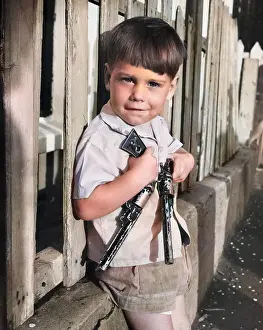 Balham: Boy with two guns, Balham, SW London