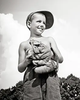 Jaunty: Boy Holding Baseball and Oversize Leather Glove