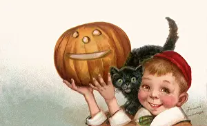 Haloween: Boy Holding Up Jack-o-Lantern