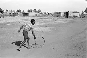 Deemed: Boy with hoop. Mathopiestad was a productive farming