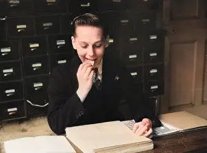 Licks: BOY LICKING STAMPS