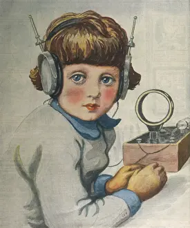 Radios: Boy listening to a radio