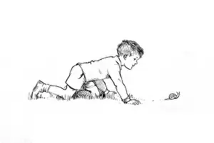 Snails: Boy looking at a snail